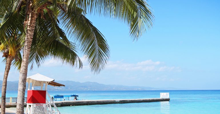 Pier and beach at Doctors Cave Beach in Jamaica